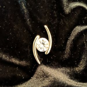 Silver and clear stone pendant